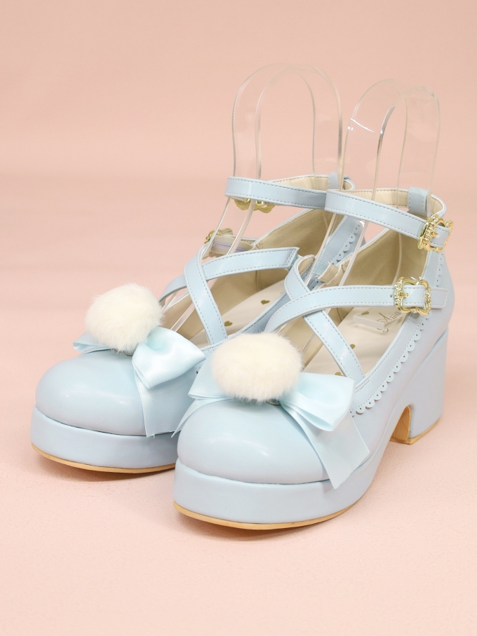 Cross pumps with fur ribbon